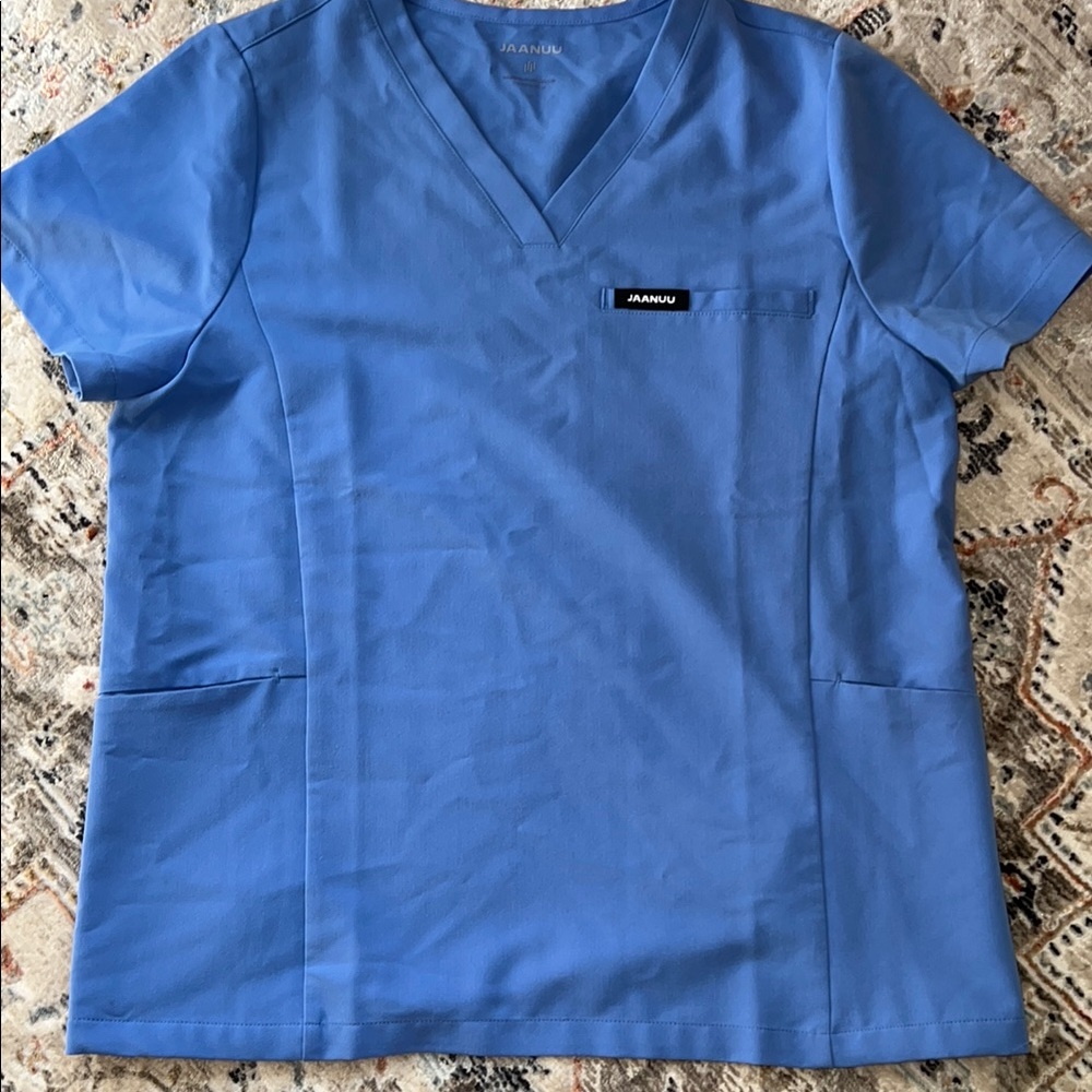 Jaanuu Ceil Blue V-Neck Scrub Top and jogger pants